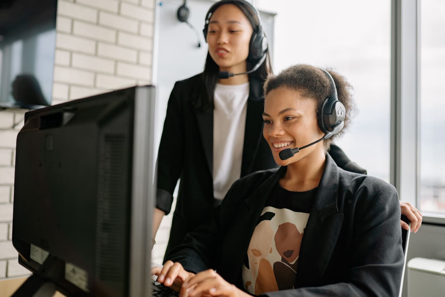 A friendly support team taking a call