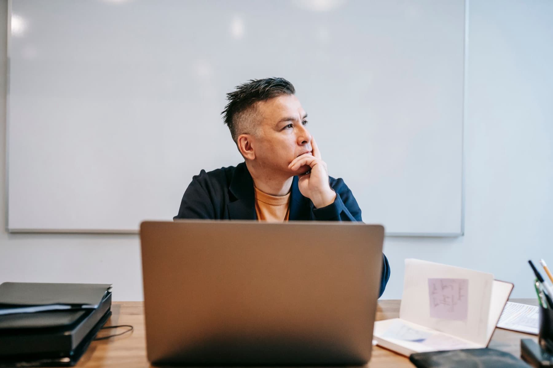 Someone working through a question at a laptop