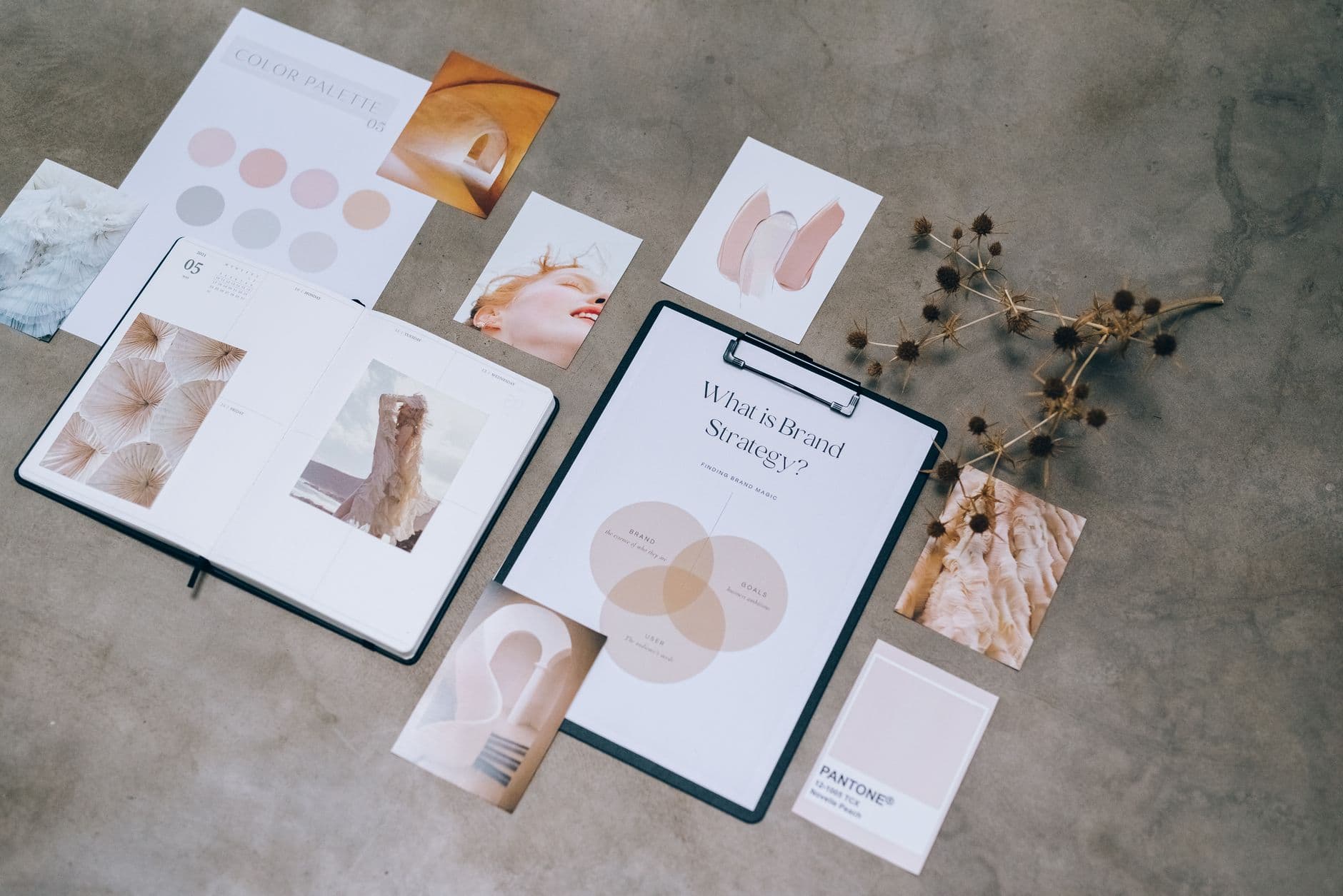 Writing and design materials on a desk
